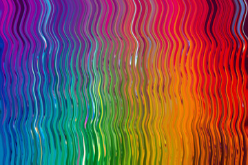 Abstract background with vertical wavy lines in rainbow colors