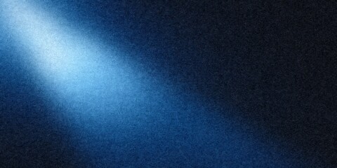 Blue spotlight creating light beam on dark abstract background with noise texture and grain effect