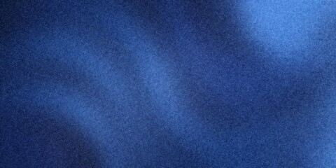 Blue glitter texture creating a sparkling abstract background with shimmering light and dark tones