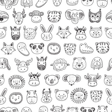 Seamless pattern with cute hand drawn animals heads. Vector illustration.