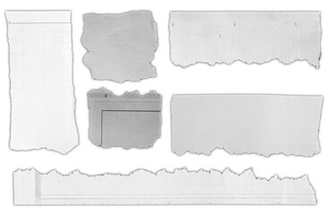 Fototapeta premium Torn pieces of paper on white