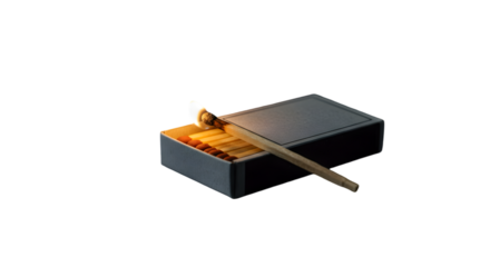 Wooden matchbox with a striking burning match — close-up stock photo

