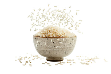 Graceful grains of rice cascade from a bowl in an artistic kitchen display against a clean backdrop