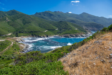 Scenic Corsica Island Coastal View of Mountains and Ocean During Sunny Day in Summer