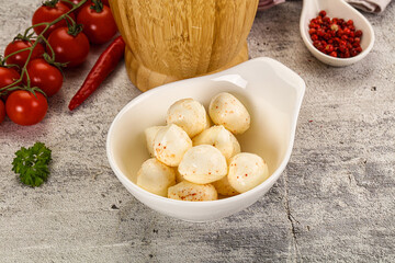 Mozzarella balls cheese in the bowl