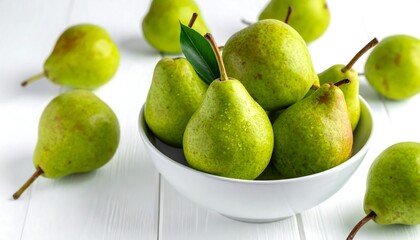 A close-up image showcases a white bowl filled with green pears, some scattered around. The fruit has a natural, textured surface