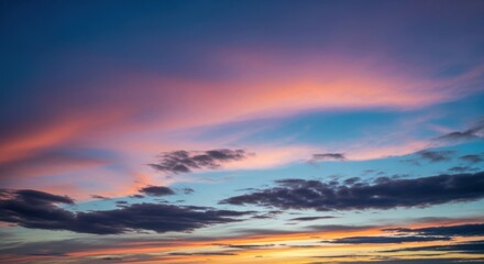 Fototapeta premium Vibrant sunset paints the sky with hues of pink blue and orange
