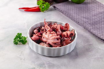 Marinated canned mini baby octopus