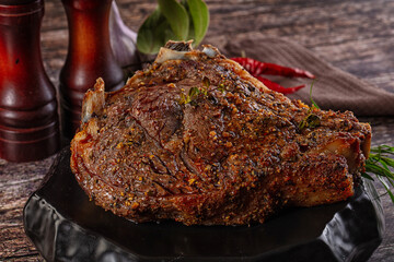 Baked beef steak on the bone
