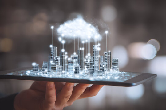 Digital city: buildings on a tablet connected to cloud, showcasing urban technology & futuristic cityscape concepts.