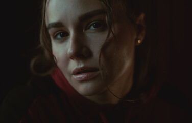 Fototapeta premium Close-up emotional portrait of a beautiful woman