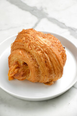 croissant on a white plate