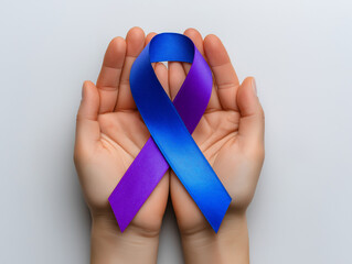 Hands holding a vibrant purple and blue awareness ribbon, symbolizing support and solidarity for various causes, conveying hope and unity in a minimalist setting