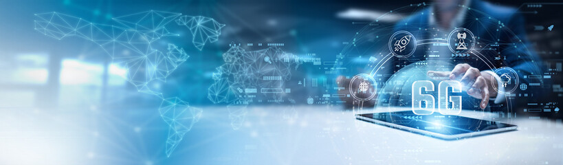 Businessman using tab and analysis 6G technology data. ultra-fast wireless networks, holographic...