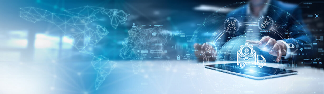 Businessman using laptop and analysis logistic management data. supply chain visibility systems, warehouse automation solutions, freight and transportation tracking, inventory optimization platforms