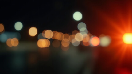 Blurred city lights at night create a soft and dreamy atmosphere