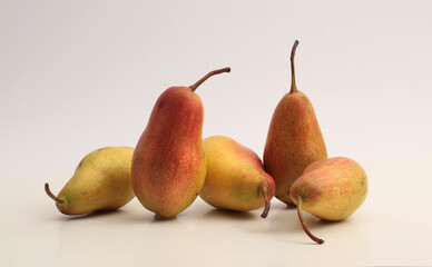 Pear group on beige gray. Art minimal still life.