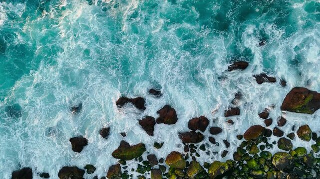 Breaking surf lines and turbulent whitewater, aerial view. Abstract sea pattern for overlays and motion backgrounds