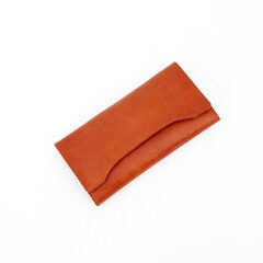 Beautiful tan leather wallet for women isolated on white background