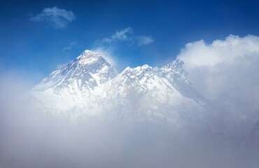 Mount Everest and Lhotse peak among the clouds