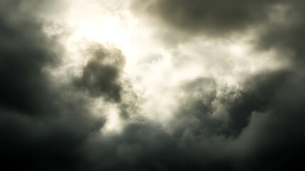 Dramatic Clouds: A storm brewing overhead. Ominous sky filled with dark, billowing clouds, suggesting impending rain or a powerful atmospheric event.