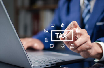 E-tax, Businessman show TAX for Individual income tax return form online for tax payment concept. Government, state taxes. Data analysis, paperwork, financial research, report. Calculation tax return.