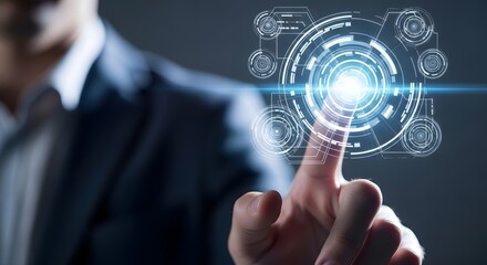Obraz premium Businessman touching glowing futuristic digital interface with abstract circular technology graphic on dark background