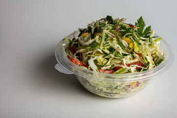 Fresh vegetable salad with cabbage, corn, bell pepper, and herbs. Perfect for healthy eating, summer lunches, and light dinners