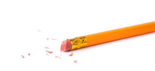 Eraser on paper. Erasing what was written, deleting an error, correcting mistake