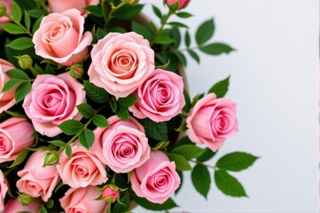 Obraz premium Delicate pink roses and lush greenery arranged in a charming corner bouquet, wedding, greenery, event