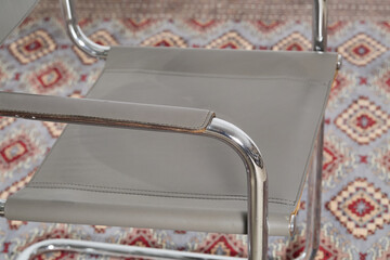 Tubular steel armchair with grey seat and back, Bauhaus style
