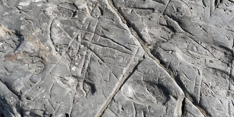 Dark cracked slate rock texture background