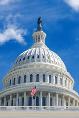 Obraz premium Close-Up of Capitol Dome with Waving American Flag