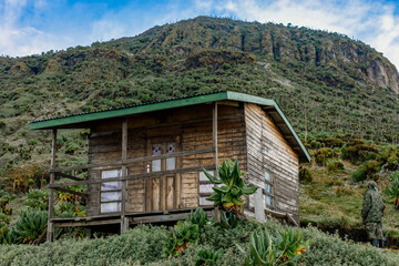 Cabins in the mountains at Mount Muhabura in the Mgahinga Gorilla National Park in Uganda