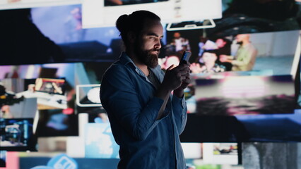 Smartphone user addicted by social media content consumption and obsessive doomscrolling that can trigger anxiety and harmful self esteem issues in the digital world. Overuse isolation. Camera A.