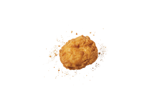 A single, crispy fried chicken nugget with crumbs, isolated on a transparent background. background removed