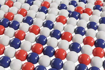 Repeating pattern of red, white, and blue spheres creates a visually striking, abstract, and colorful design.