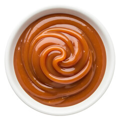 Delicious homemade caramel sauce in a white bowl isolated on transparent background, top view, perfect for dessert