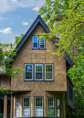 Beautiful family home with steep gable roof and multiple windows in Brookline, Massachusetts, USA
