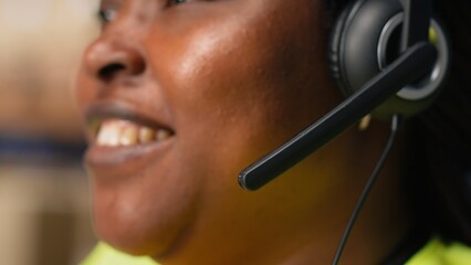 Call center clerk parcel tracking and order dispatch on help line, working in an online shopping...