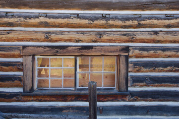 Rustic Log Cabin Window Set in Weathered brown Wood Wall Horizontal Lines of logs.Clear windows ...