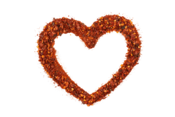 Crushed red pepper flakes arranged in a heart shape on a transparent background. background removed