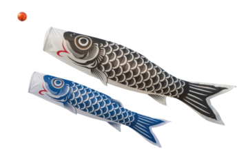 Two koi fish-shaped windsocks, one black and one blue, against a transparent background, with a small red ball above. background removed