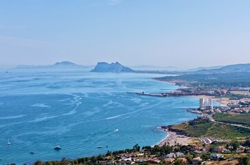 aerial view along the coast near Manilva with a view towards Torreguadiaro, Sotogrande and the Rock of Gibraltar and Africa at the horizon, Mediterranean Sea, Costa del Sol, Andalusia, Malaga, Spain