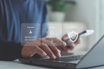 Businessman using laptop and smartphone with virtual login interface, showing password, MFA, security shield icons, cybersecurity, data protection, secure authentication in digital technology.