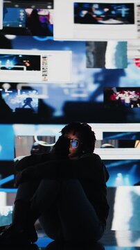 Vertical video Bored woman using mobile phone to browse internet, wasting all day watching videos. Lazy teenager procrastinating, scrolling through online social media clips on smartphone, camera A