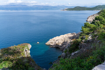 Vrbnik, Croatia - April 20, 2025: Panoramic view of the mountains and sea. Beautiful landscape of mountains, sea, and forest