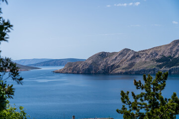 Prvić Island and Sveti Grgur, Croatia - April 20, 2025: Panoramic view of the mountains and sea.