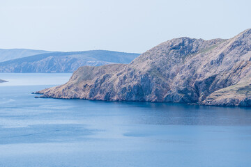 Prvić Island and Sveti Grgur, Croatia - April 20, 2025: Panoramic view of the mountains and sea.