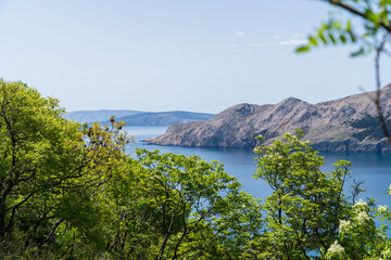 Prvić Island and Sveti Grgur, Croatia - April 20, 2025: Panoramic view of the mountains and sea.